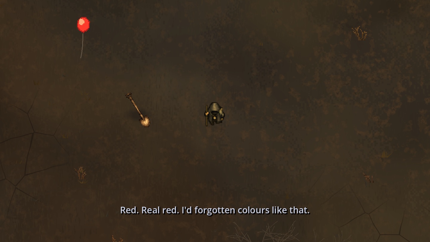 A child's red balloon tied in the empty wasteland